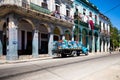 Street in Old Havana with delivery truck.