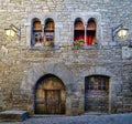 Street of an old medieval town with stone houses and cobbled floors, street lamps and an atmosphere of bygone times Royalty Free Stock Photo