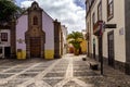 street with old, picturesque and charming houses in bright colors in the city of Las Palmas de Gran Canaria. Canary Islands. Spain