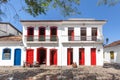 Street and old portuguese colonial houses in historic downtown i Royalty Free Stock Photo