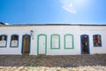 Street and old portuguese colonial houses in historic downtown i Royalty Free Stock Photo