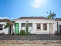 Street and old portuguese colonial houses in historic downtown i Royalty Free Stock Photo