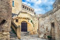 Street with old stone houses and buildings in Sassi di Matera town historical centre Sasso Caveoso Royalty Free Stock Photo