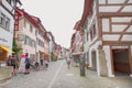 Street in old town with half-timbered facades buildings and people in Stein am Rhein, Switzerland