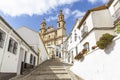 A street in Olvera town and Our Lady of the Incarnation church Royalty Free Stock Photo