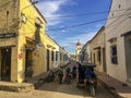 Typical street with one story buildings in sun and shadow, Santa Cruz de Mompox, Colombia, World Heritage Royalty Free Stock Photo