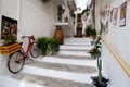 Street of Ostuni town with staircase full of blooming flowers, Apulia region, Italy, Adriatic Sea Royalty Free Stock Photo