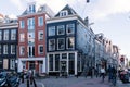 Street in Oude Pijp, a neighborhood in Amsterdam, a cloudy day o Royalty Free Stock Photo