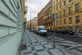 Street overlooking a yellow house in Prague