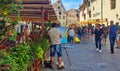 Street Painter Artist Cafe Lifestyle Tourist In the Old Town of Tallinn 2019,17.06 Summer in Estonia Europe Rickshaw bike Royalty Free Stock Photo