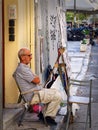 Street painter artist selling personal artwork