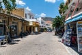 Street of Paleochora town with traditional gift shops and taverns.