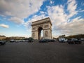 Street panorama view of historic Arc de Triomphe Etoile monument landmark traffic Champs Elysees Paris France Europe