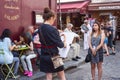 The street Parisian landscape - cafe in Montmartre with an draws artist, Paris