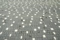 street paving stones of gray and white folded