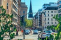 Street with people and cars near metro station Alsterhaus and lake Alster Binnenalster Hamburg, Germany. Royalty Free Stock Photo