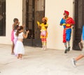 Street performance, clowns entertain children Royalty Free Stock Photo