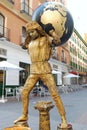 Street performer (busker) in Spain with globe