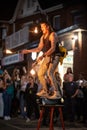 Street performer and busker Steve Goodtime juggling fire at the annual Do West Fest on Dundas Street