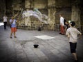 Street performer with giant bubbles