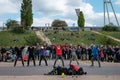 Street performer group dancing breakdance in crowded park Mauerpark in Berlin