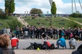 Street performer group dancing breakdance in crowded park Mauerpark in Berlin