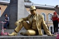 Street performer, living statue in golden costume Royalty Free Stock Photo