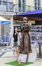 View of street performer plays a living statue in the Rua Augusta street in downtown Lisbon, Portugal
