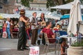 Street performers doing a show to viewer in Avignon.