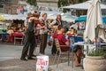 Street performers doing a show to viewer in Avignon.