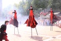 Street performers on stilts