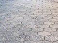 Street of hexagonal concrete blocks, badly preserved. Royalty Free Stock Photo