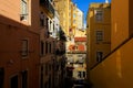 Street perspective view with colorful traditional houses in Alfama district Royalty Free Stock Photo