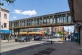 Street Photography. Brooklyn New York, Pedestrian bridge, Skyway, skybridge, skywalk above a road.