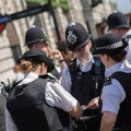 London, United Kingdom- June 2019: Street Photography: Group of London Policemen with Their Uniform