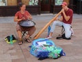 Street photography - two musicians playing on hang drum and didgeridoo in Bratislava