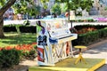 Street piano painted in all colors of the rainbow