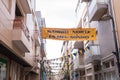 Street in Povoa de Varzim, Portugal decorated with banners and pennants to celebrate Sao Pedro festival