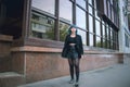 Street punk or hipster girl enjoying empty old European street