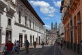 Cyclists in Quito, cathedral, street