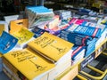 Street rack of Paris maps and tourist booklets, Paris, France