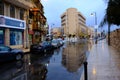 Street with reflections on the ground after rain in Madaba, Jordan in gloomy weather