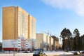 Street with residential buildings and cars