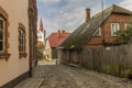 Street with residential houses in the old town of Cesis Royalty Free Stock Photo