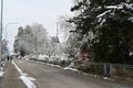 Street in residential quarter of village Urdorf in Switzerland in winter. Royalty Free Stock Photo