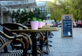 restaurant open street terrace. round tables and decorative succulent plants in pink pots Royalty Free Stock Photo