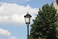 Street retro lamp against the blue sky