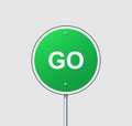 Street road green sign go. Round warning symbol on pole