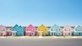 Street with row of modern family houses with multicolored facades under blue sky