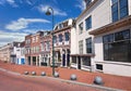 Street with row of renovated houses with lantern, Gouda, Netherlands